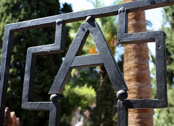 UA logo on gate