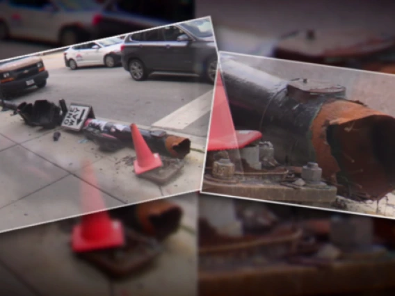 A rusted traffic light was spotted after falling onto the sidewalk in the West Loop. The traffic light pole once towered over the intersection at Washington and Morgan, but was lying on the sidewalk. Rust appeared to consume the pole's base.