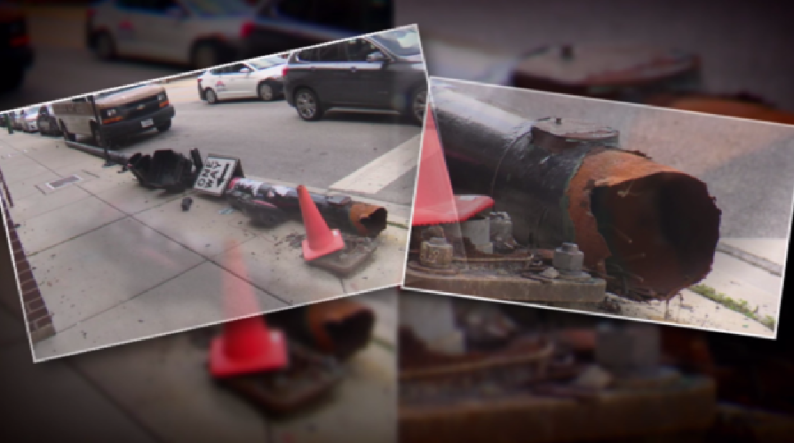 A rusted traffic light was spotted after falling onto the sidewalk in the West Loop. The traffic light pole once towered over the intersection at Washington and Morgan, but was lying on the sidewalk. Rust appeared to consume the pole's base.