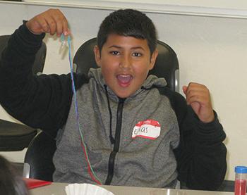 A Mansfeld Middle School student gets into Science Day, organized by the UA student chapter of the Society of Hispanic Professional Engineers.